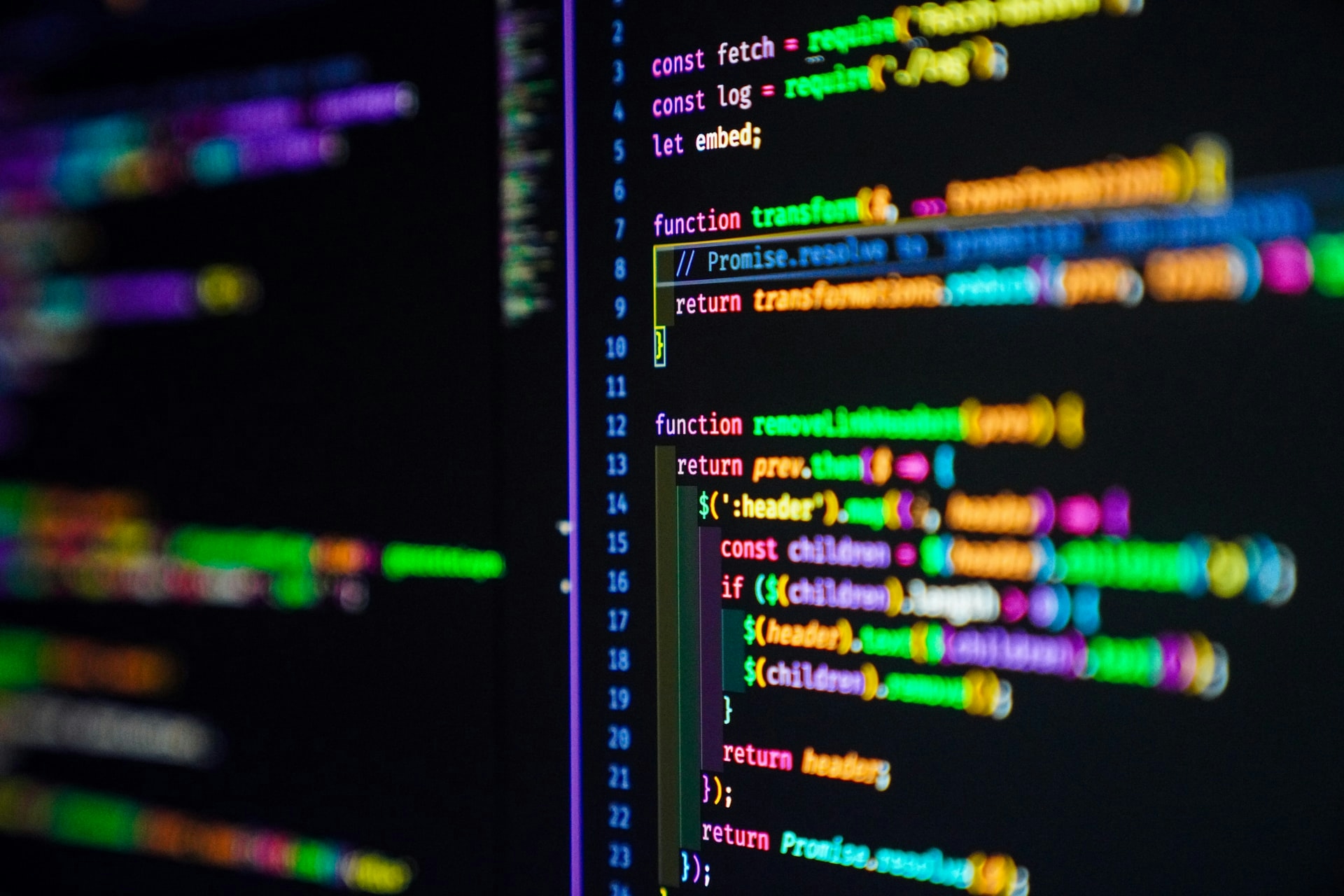 Colorful JavaScript code on the monitor screen